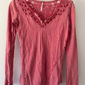 Cranberry red long sleeve Free People tee with cut detail